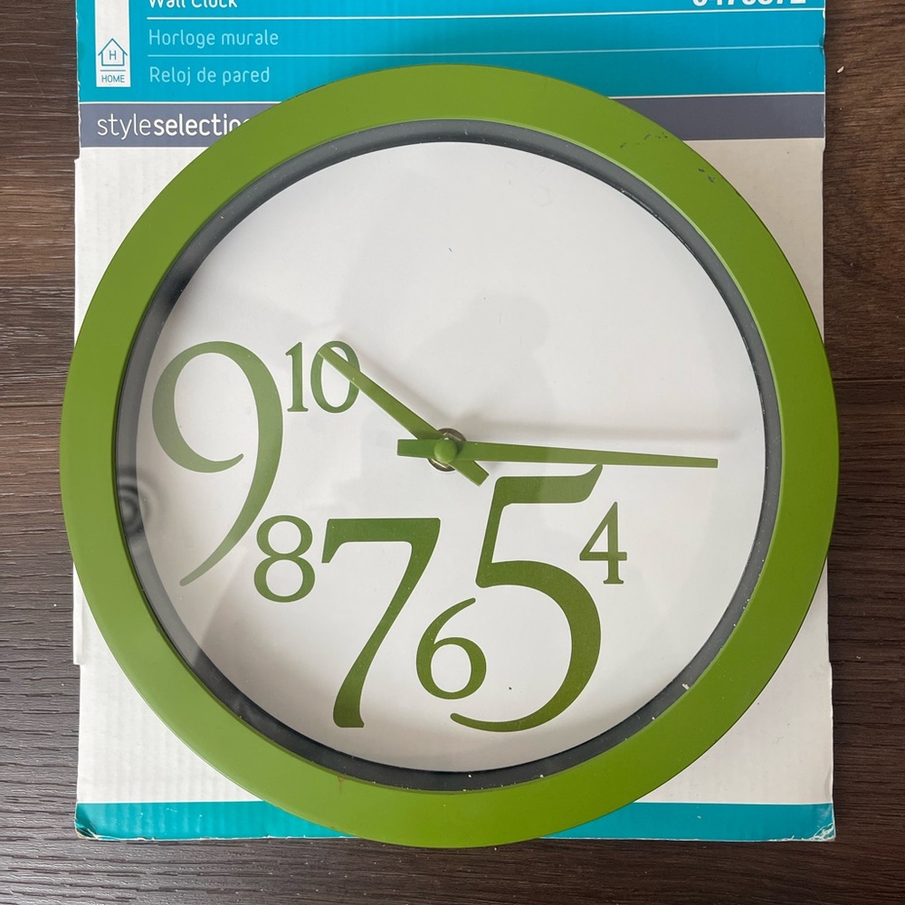 Modern Green and White Wall Clock with Artistic Numerals